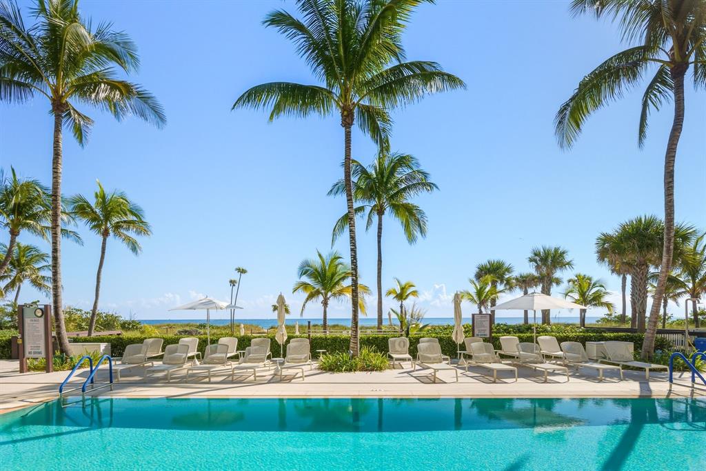730 North Ocean Boulevard, Unit 404 Pompano Beach, FL 33062 - Photo 41 of 47 a view of outdoor space with palm trees