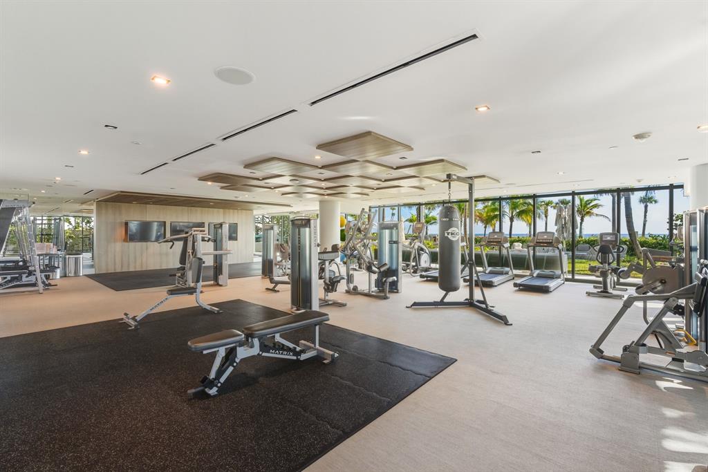 730 North Ocean Boulevard, Unit 404 Pompano Beach, FL 33062 - Photo 42 of 47 a view of a room with gym equipment