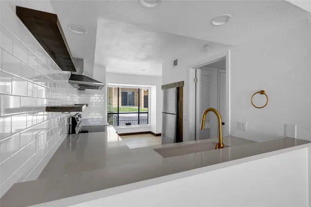 a view of a living room and dining room