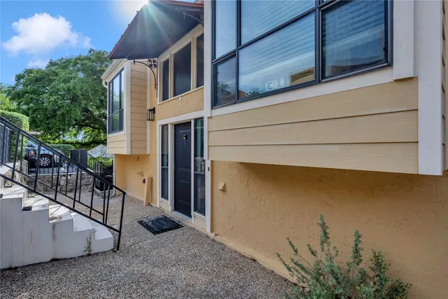 a view of a house with a street