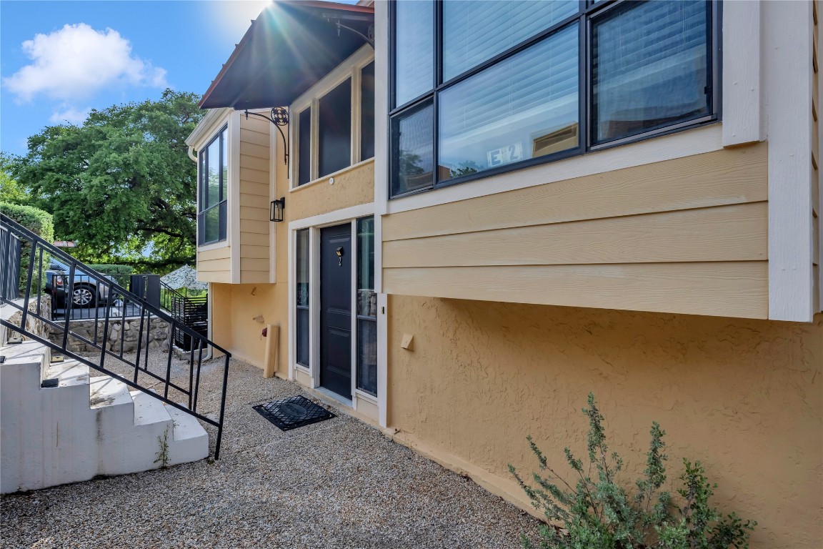 402 Hi Stirrup, Unit E2 Horseshoe Bay, TX 78657 - Photo 3 of 39 a view of a house with a street
