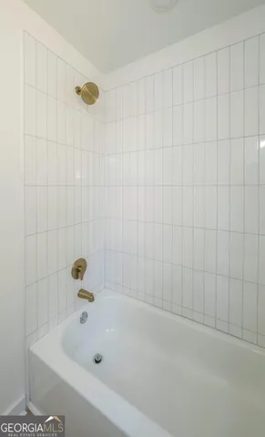 a bathroom with a bathtub