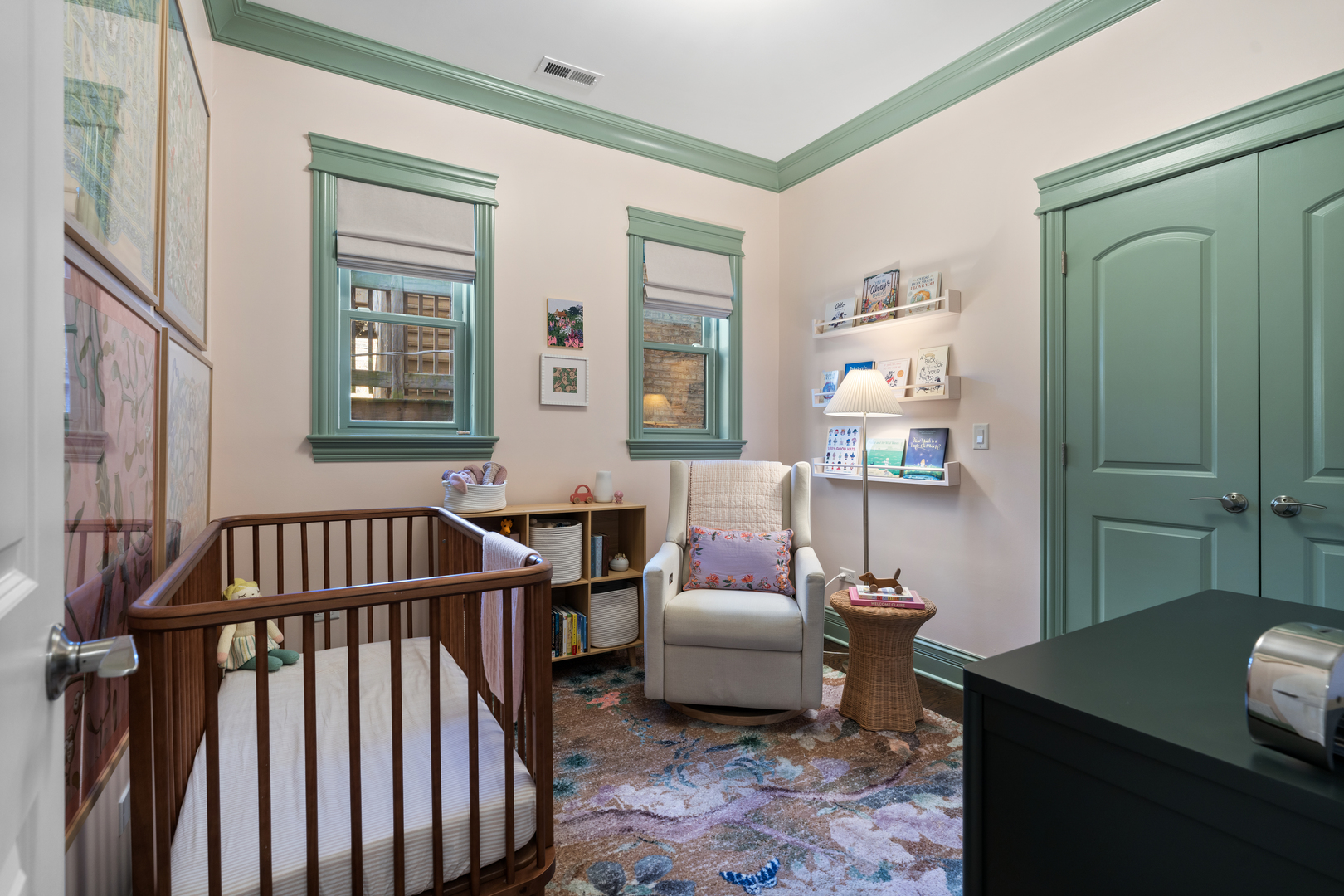 2680 North Orchard Street, Unit 2 Chicago, IL 60614 - Photo 21 of 27 a bedroom with a bed and a chandelier