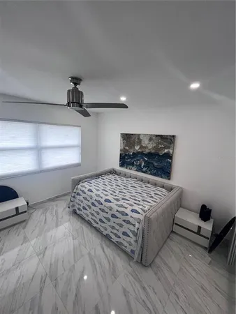 a view of hallway with wooden floor