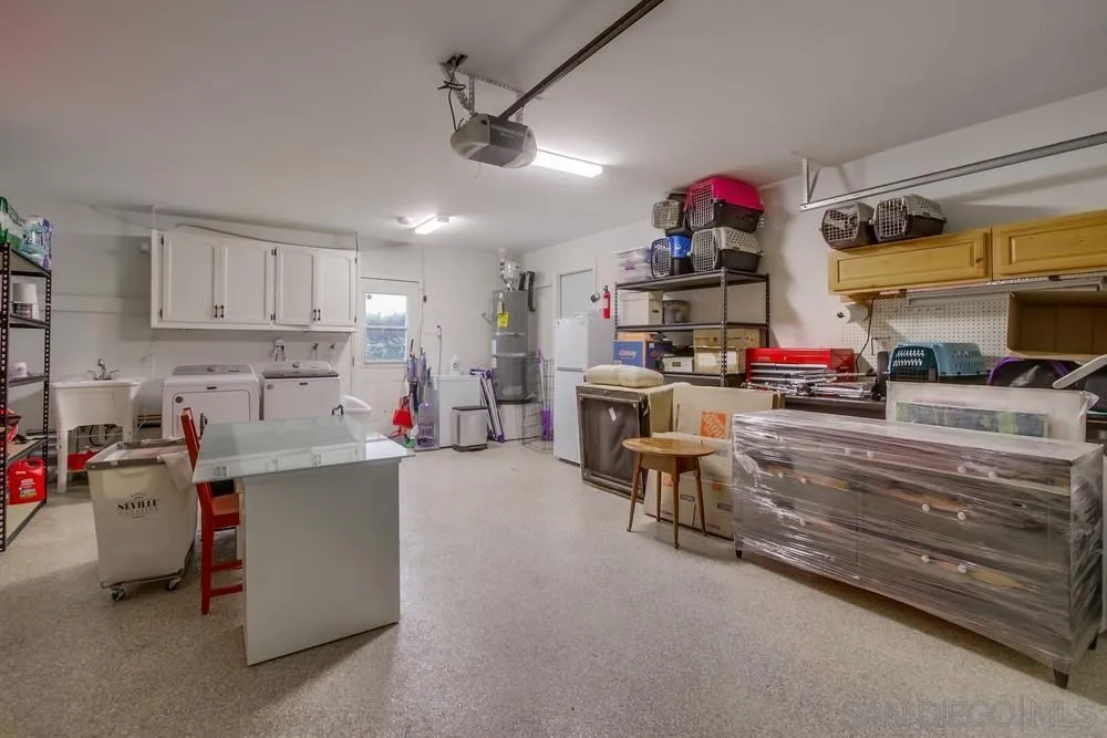 10520 El Nopal Santee, CA 92071 - Photo 20 of 34 a living room with lots of furniture and clutter