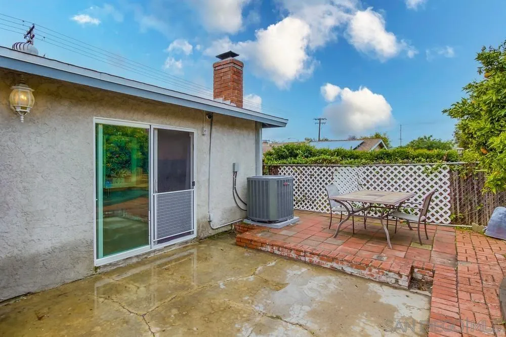 10520 El Nopal Santee, CA 92071 - Photo 26 of 34 a view of a chair and table in backyard of the house