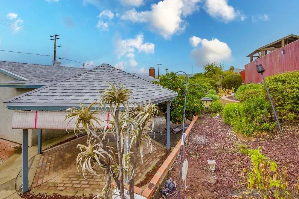 10520 El Nopal Santee, CA 92071 - Photo 30 of 34 a roof deck with table and chairs