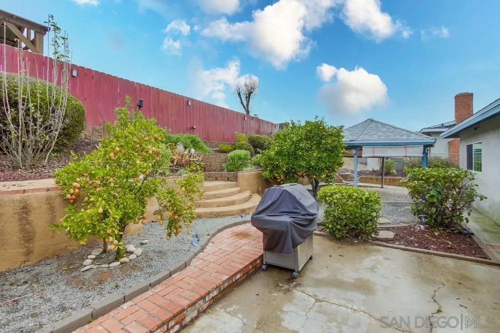 10520 El Nopal Santee, CA 92071 - Photo 33 of 34 a view of a chair and table in the backyard