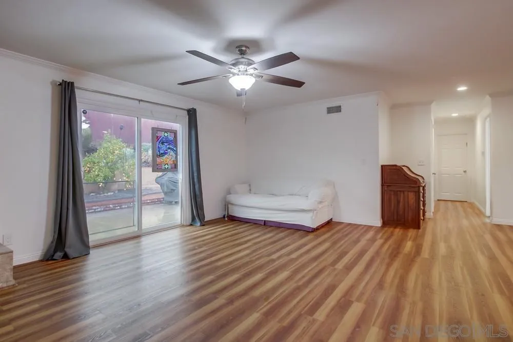 10520 El Nopal Santee, CA 92071 - Photo 7 of 34 a spacious bedroom with a bed and a flat screen tv