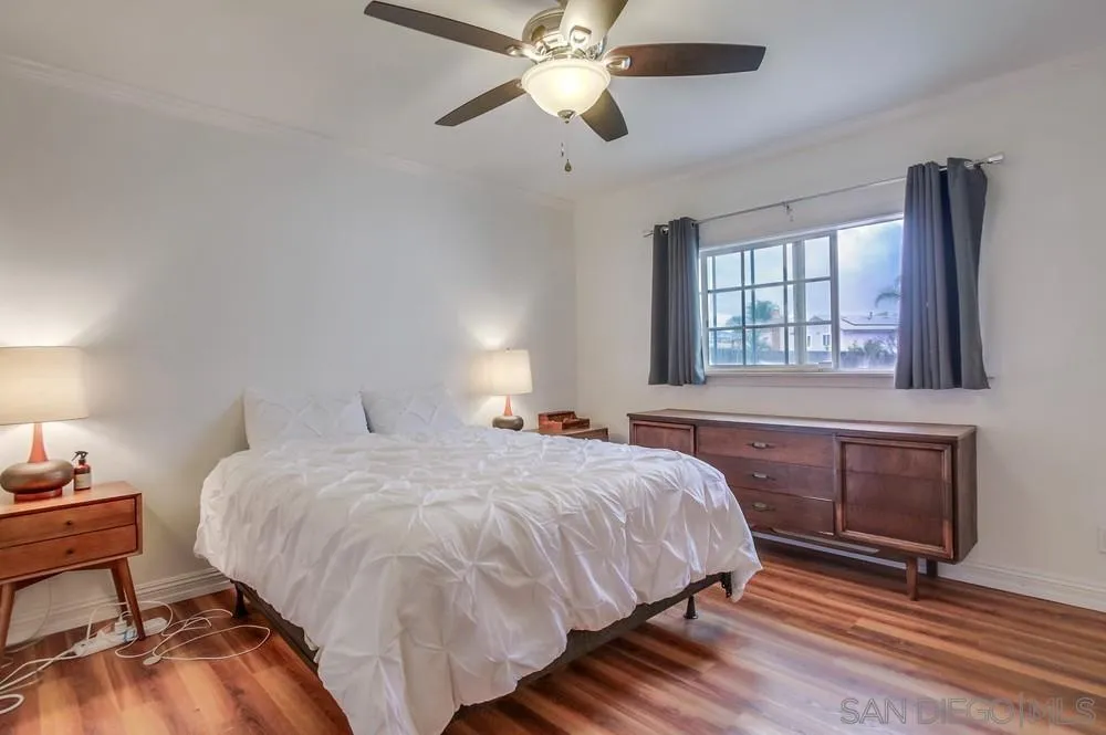 10520 El Nopal Santee, CA 92071 - Photo 9 of 34 a bedroom with a bed and window