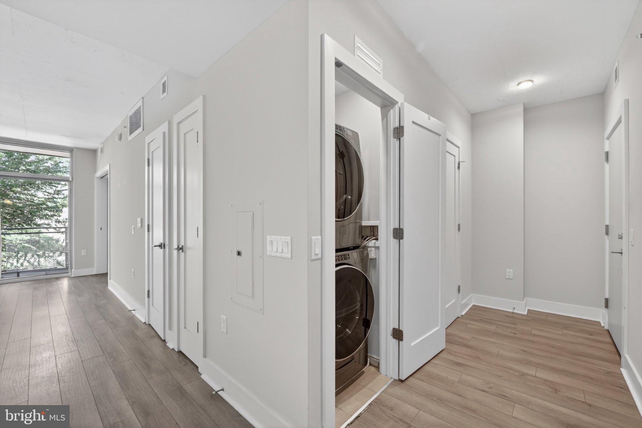 88 V Street Southwest, Unit 213 Washington, DC 20024 - Photo 4 of 26 Modern entryway with laundry nook.