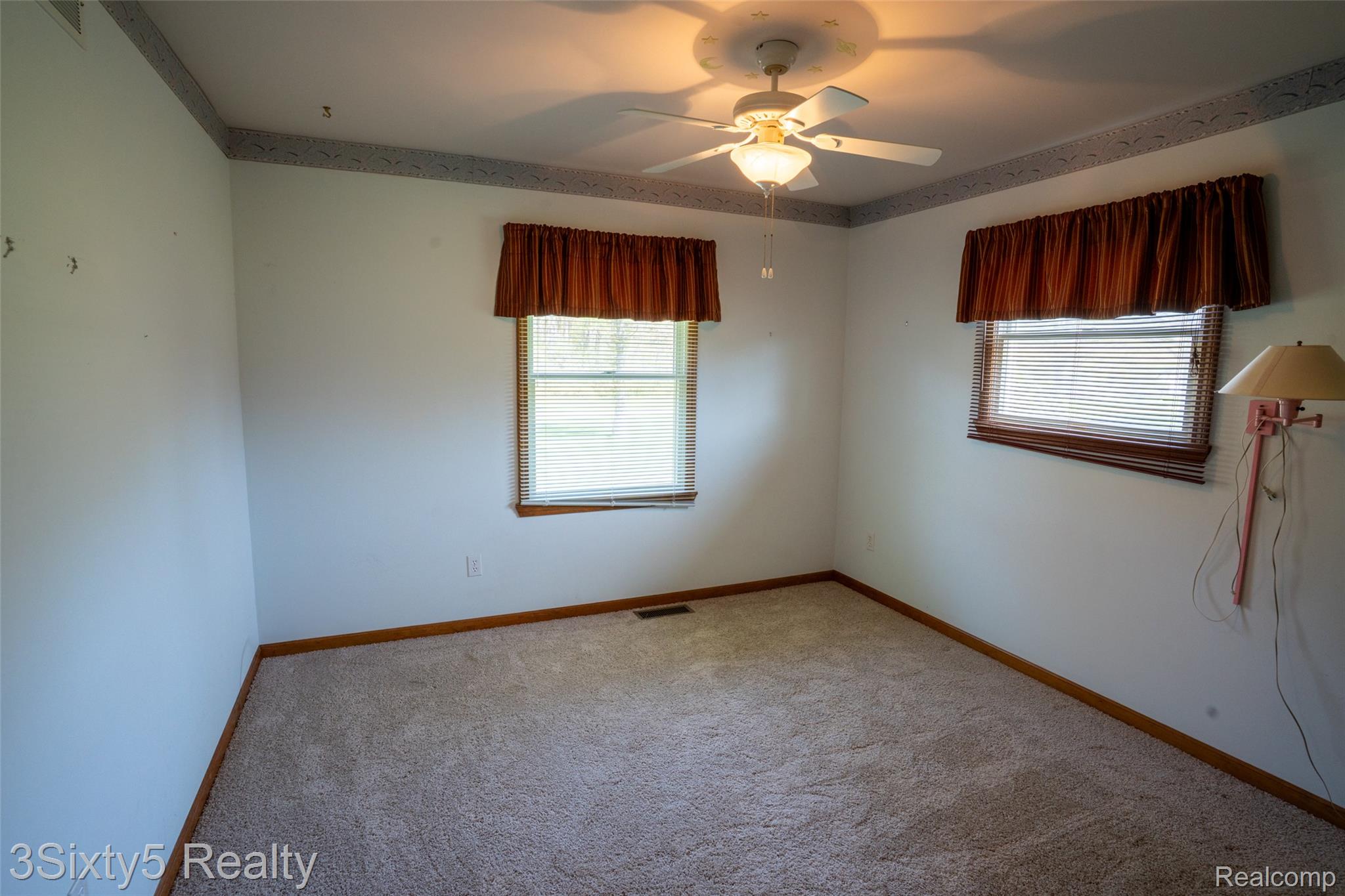 1783 Farnsworth Road Lapeer, MI 48446 - Photo 20 of 51 Spare room with light carpet and ceiling fan