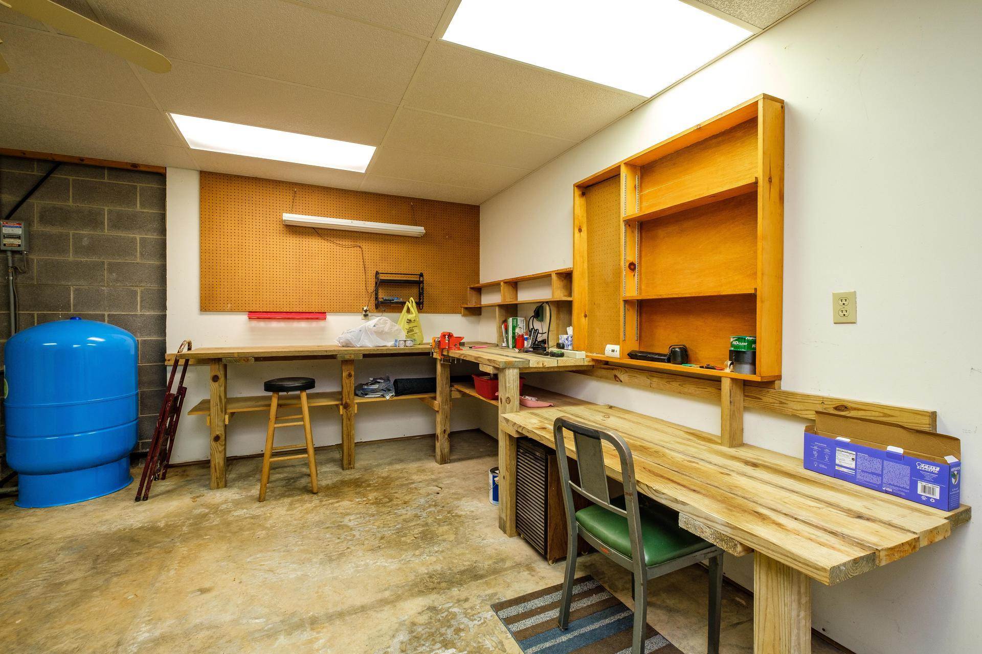 3878 Shutterlee Mill Road Staunton, VA 24401 - Photo 26 of 63 a room with a table chairs and a stove