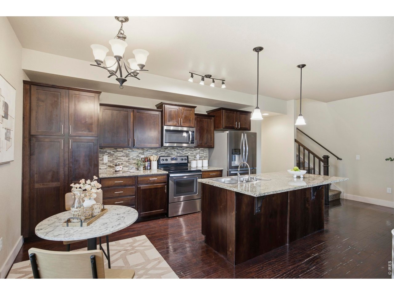 2163 Scarecrow Road Fort Collins, CO 80525 - Photo 5 of 25 Eat-in kitchen with Granite Island