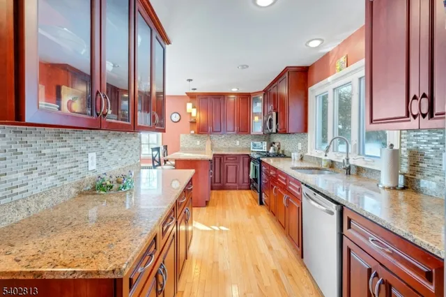 a view of a livingroom with furniture and a window