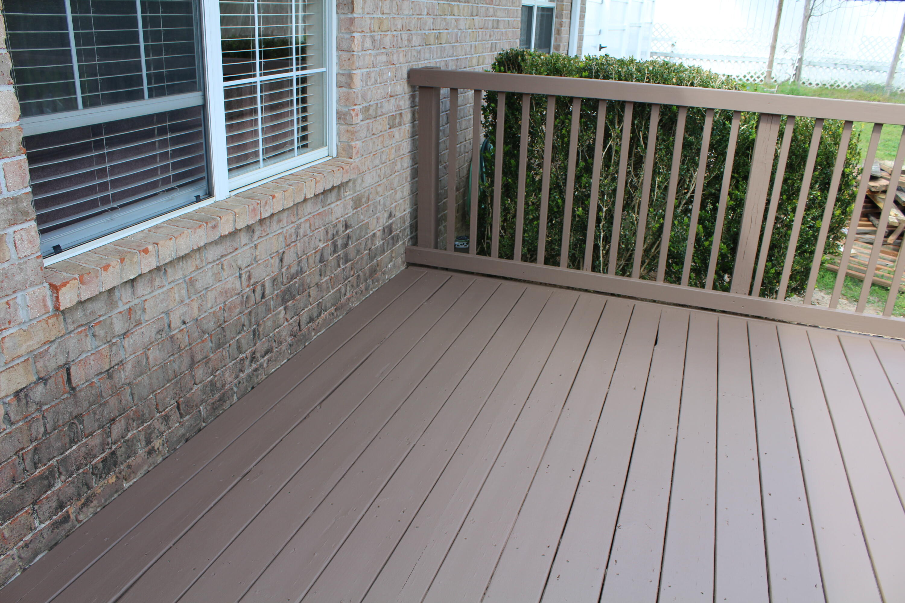 5205 Whitehurst Lane Crestview, FL 32536 - Photo 33 of 37 a view of wooden balcony