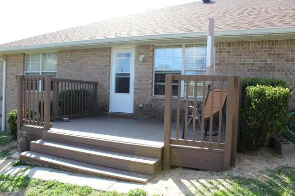 a view of house with outdoor seating space