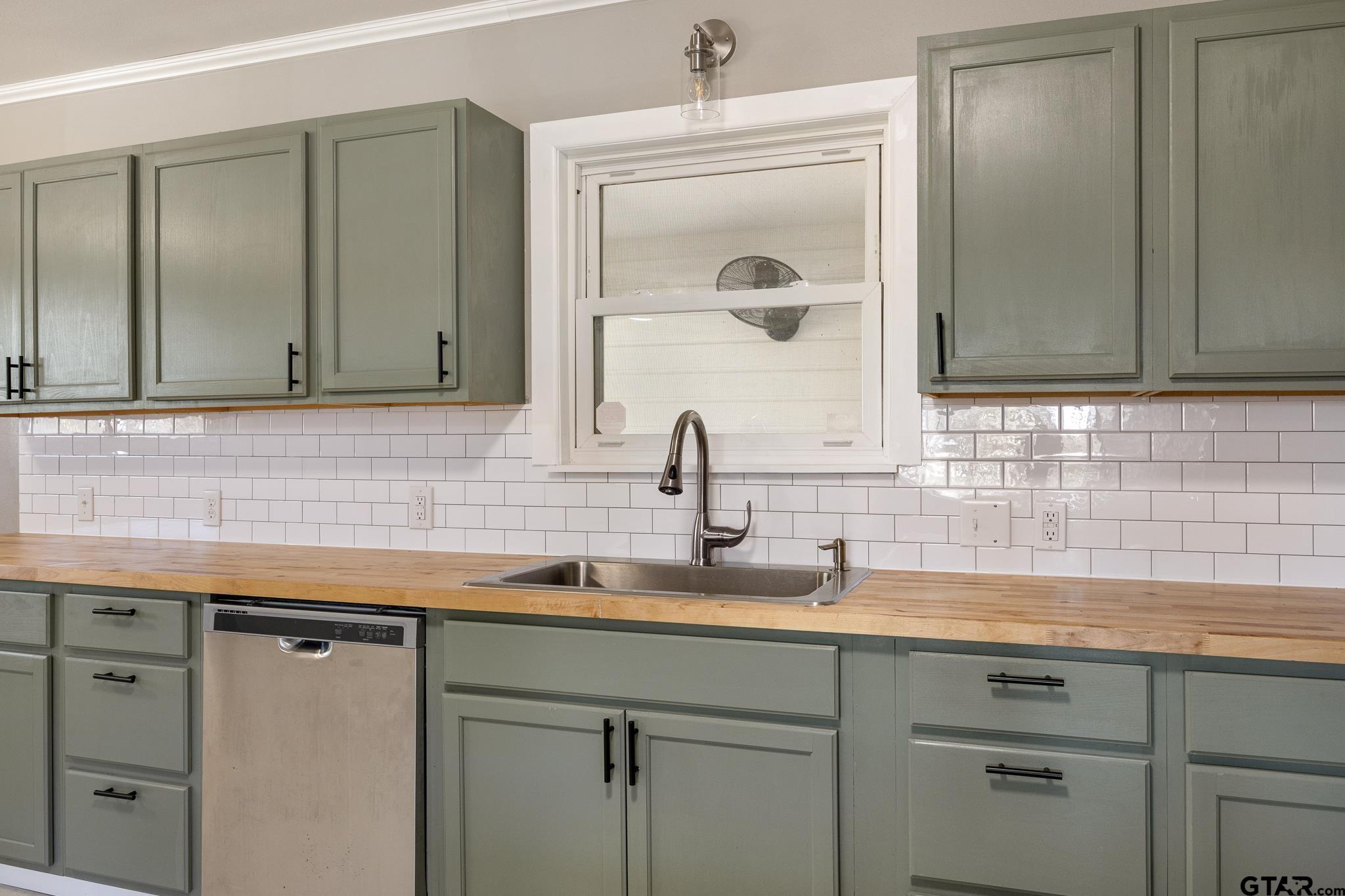 291 East Main Street Van, TX 75790 - Photo 12 of 43 a bathroom with a sink and a mirror
