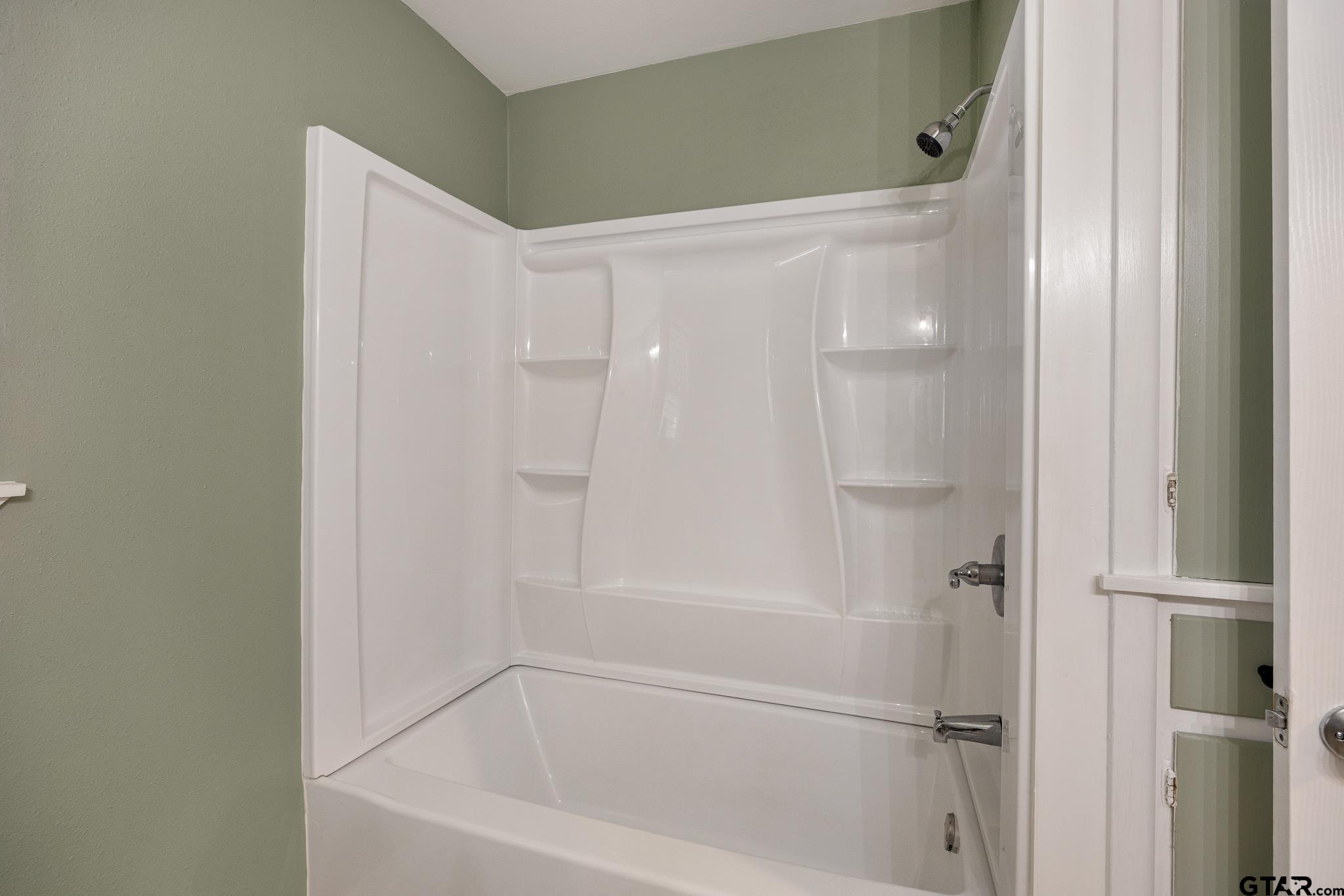 291 East Main Street Van, TX 75790 - Photo 16 of 37 a close view of a bathtub in bathroom
