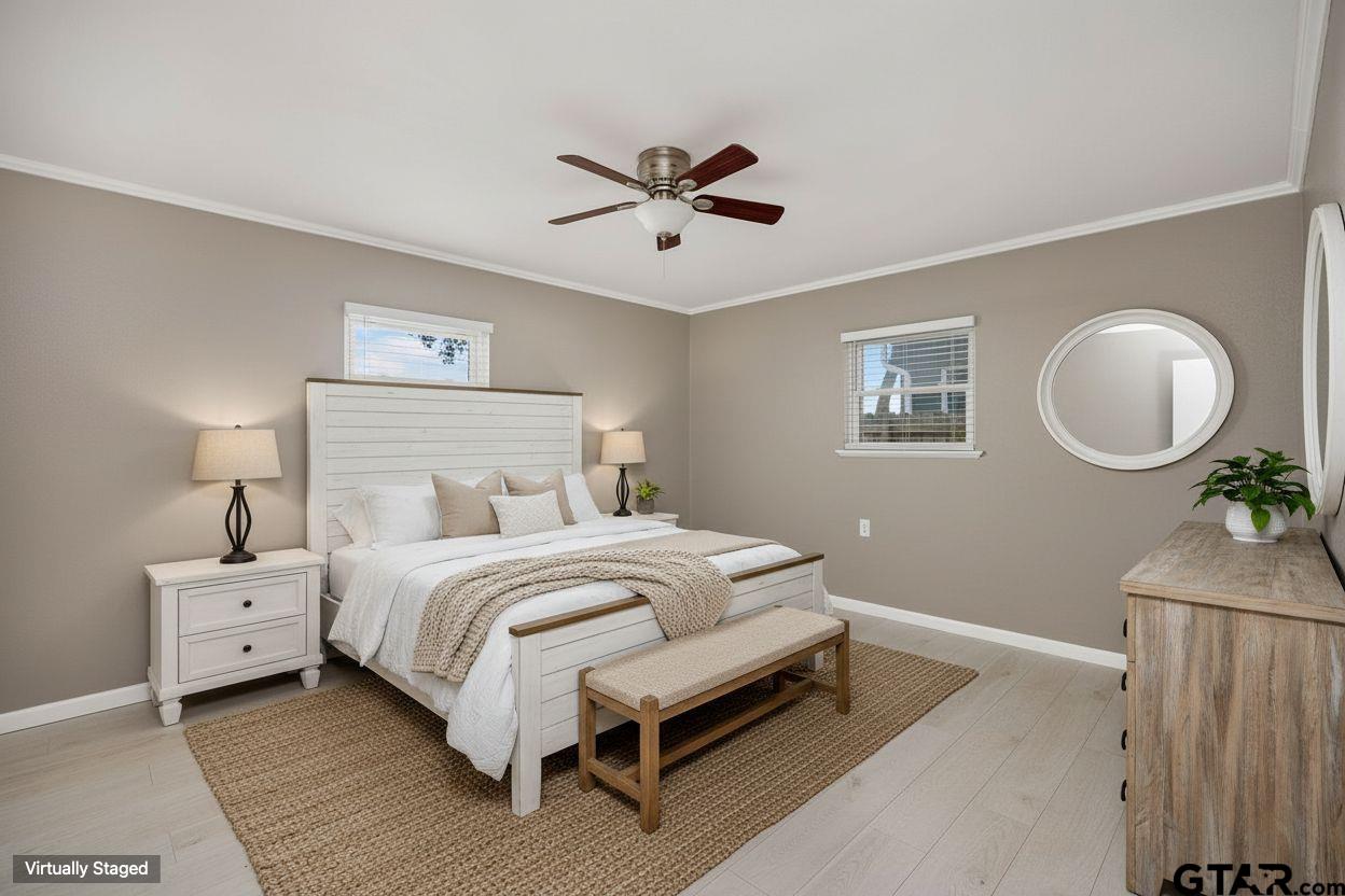 291 East Main Street Van, TX 75790 - Photo 21 of 43 a bedroom with bed and a chandelier