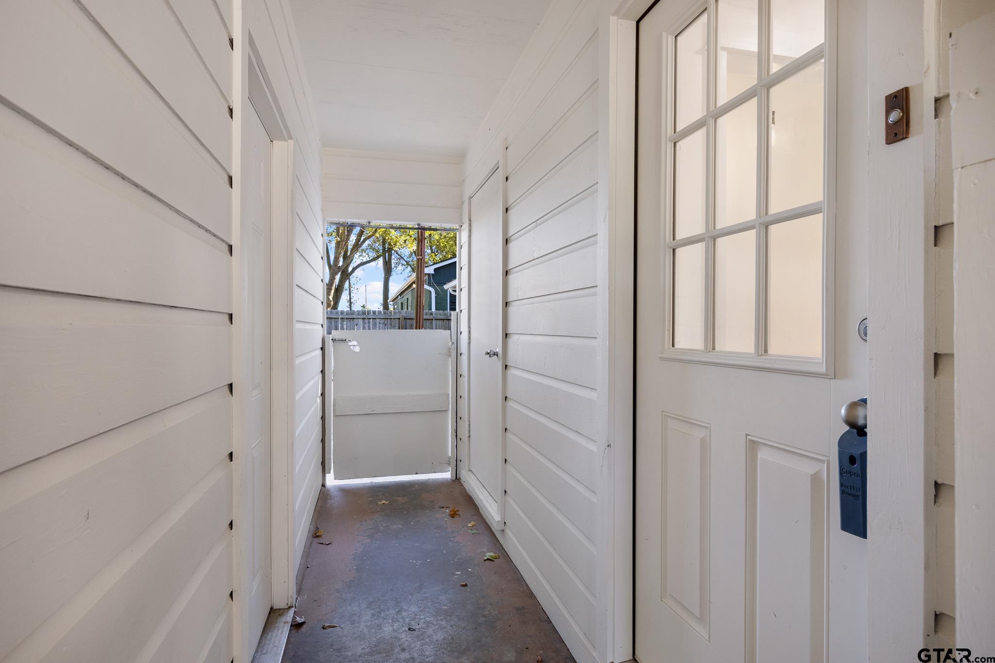 291 East Main Street Van, TX 75790 - Photo 23 of 37 a view of a hallway with wooden floor and entryway