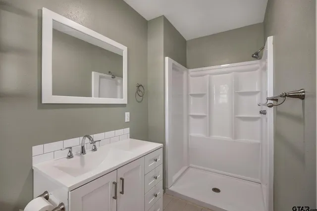 a bathroom with a sink and a toilet