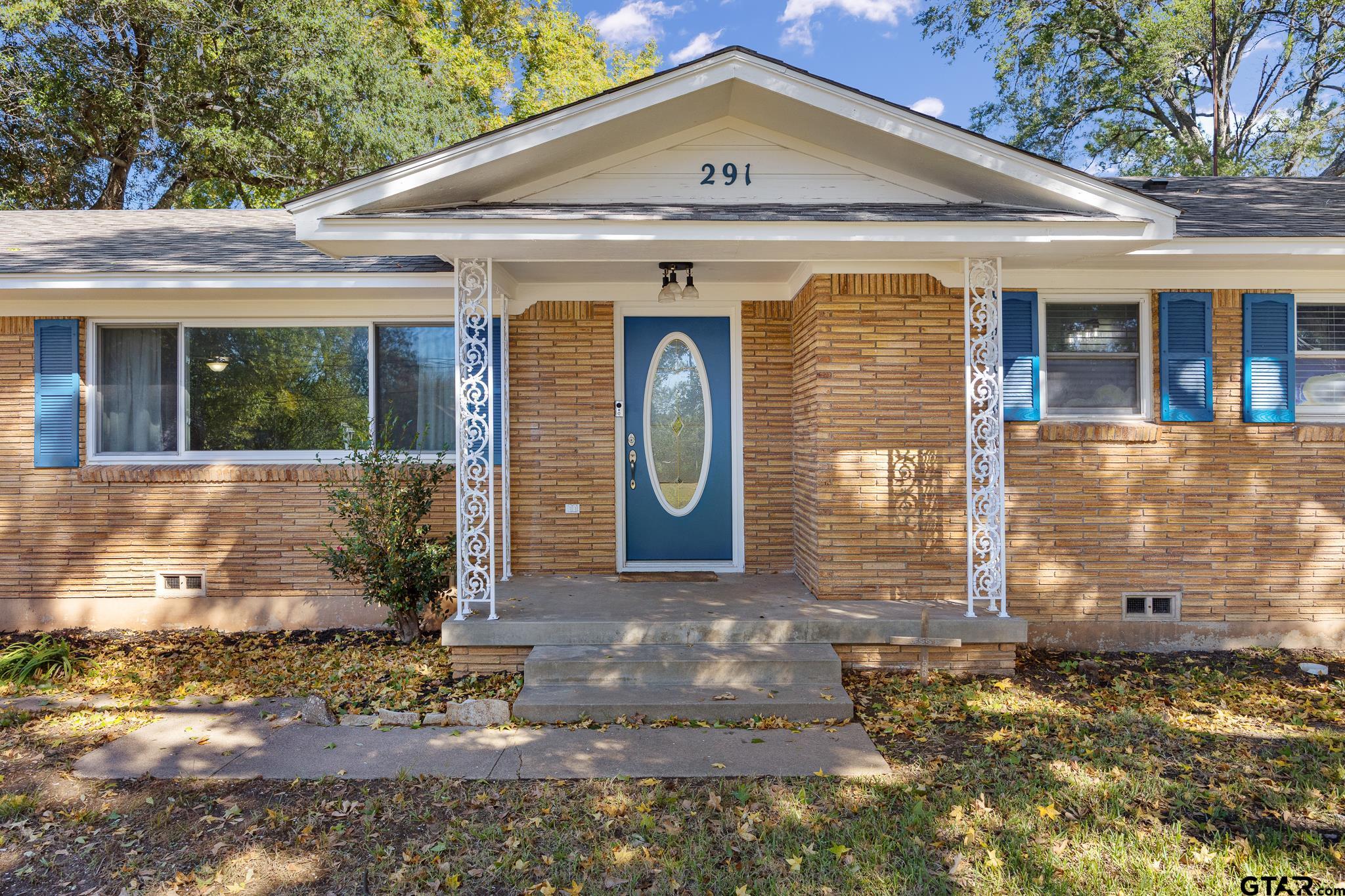 291 East Main Street Van, TX 75790 - Photo 31 of 37 a front view of a house with garden