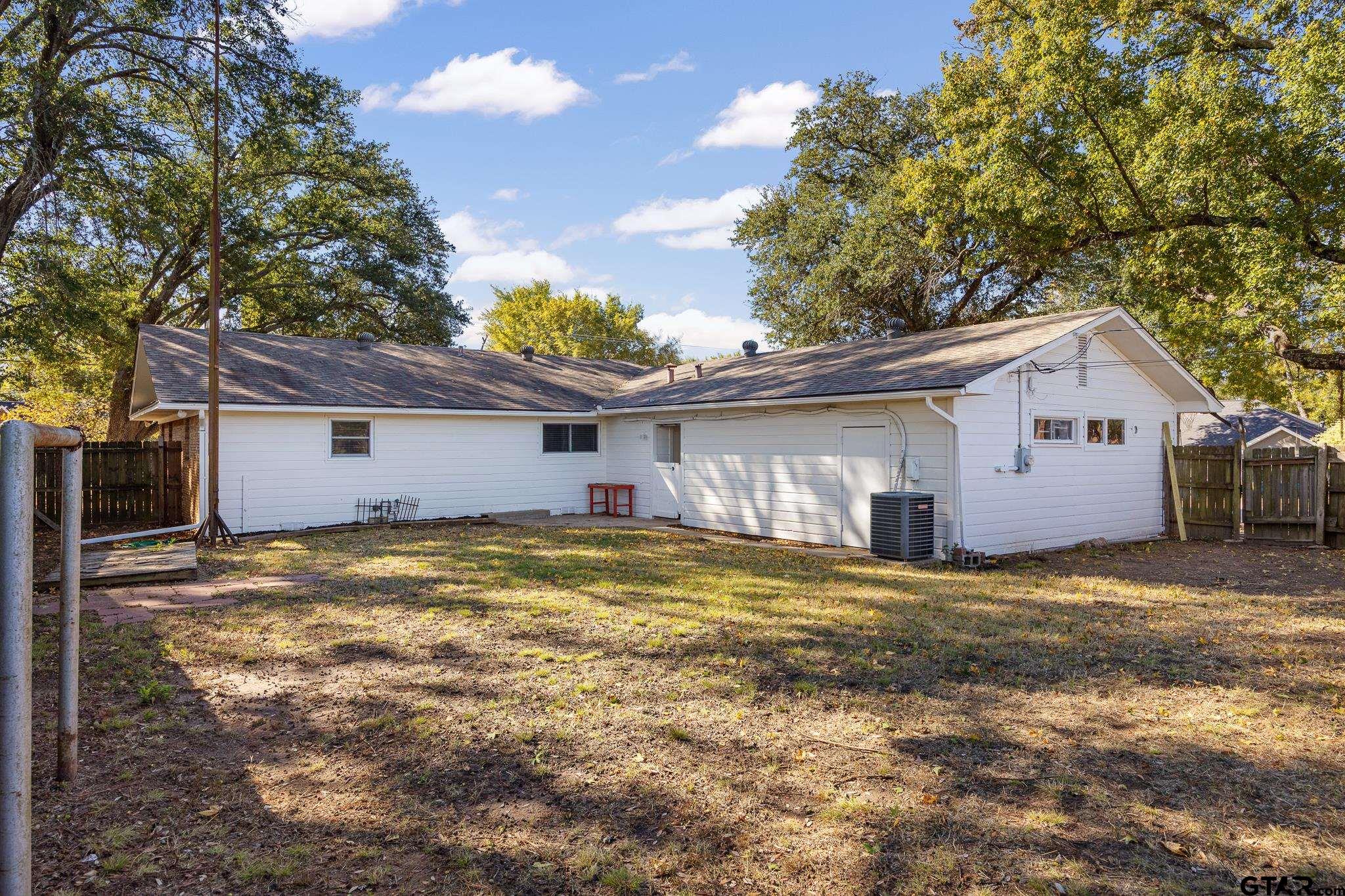 291 East Main Street Van, TX 75790 - Photo 32 of 43 a view of a house with a yard