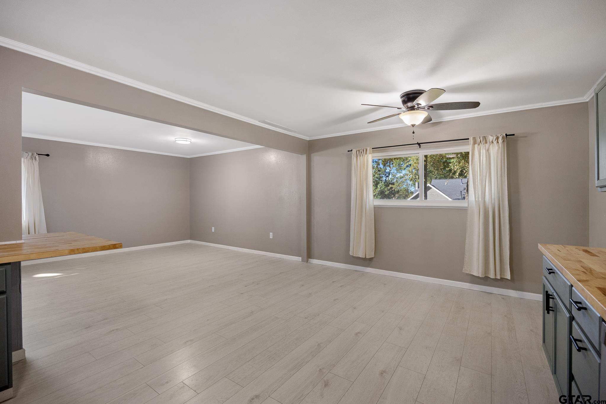 291 East Main Street Van, TX 75790 - Photo 6 of 37 a view of an empty room with a window
