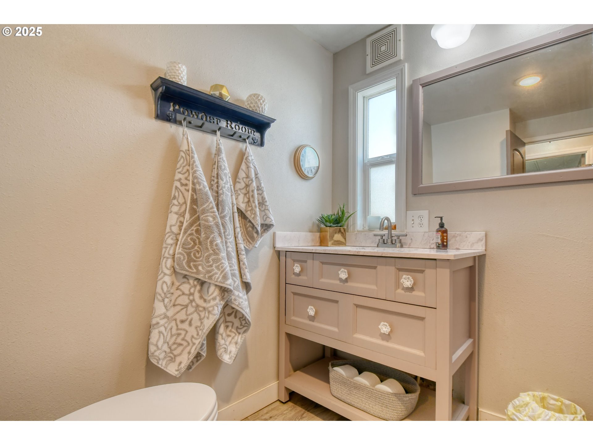 330 2nd Street Athena, OR 97813 - Photo 12 of 30 a bathroom with a sink and a mirror