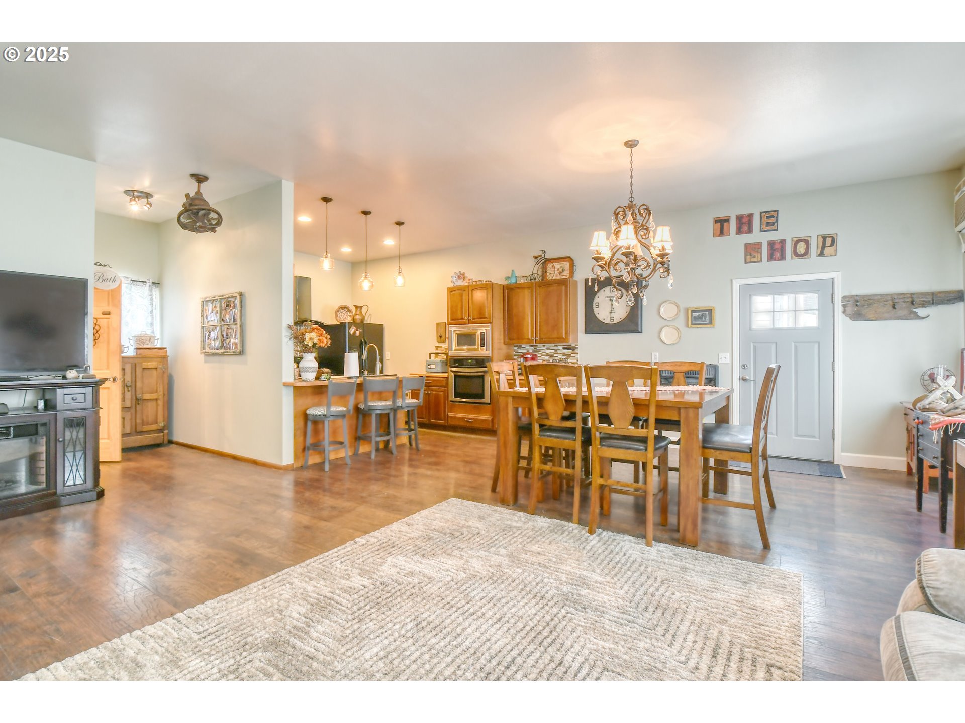 330 2nd Street Athena, OR 97813 - Photo 17 of 30 a dining room filled with furniture and wooden floor