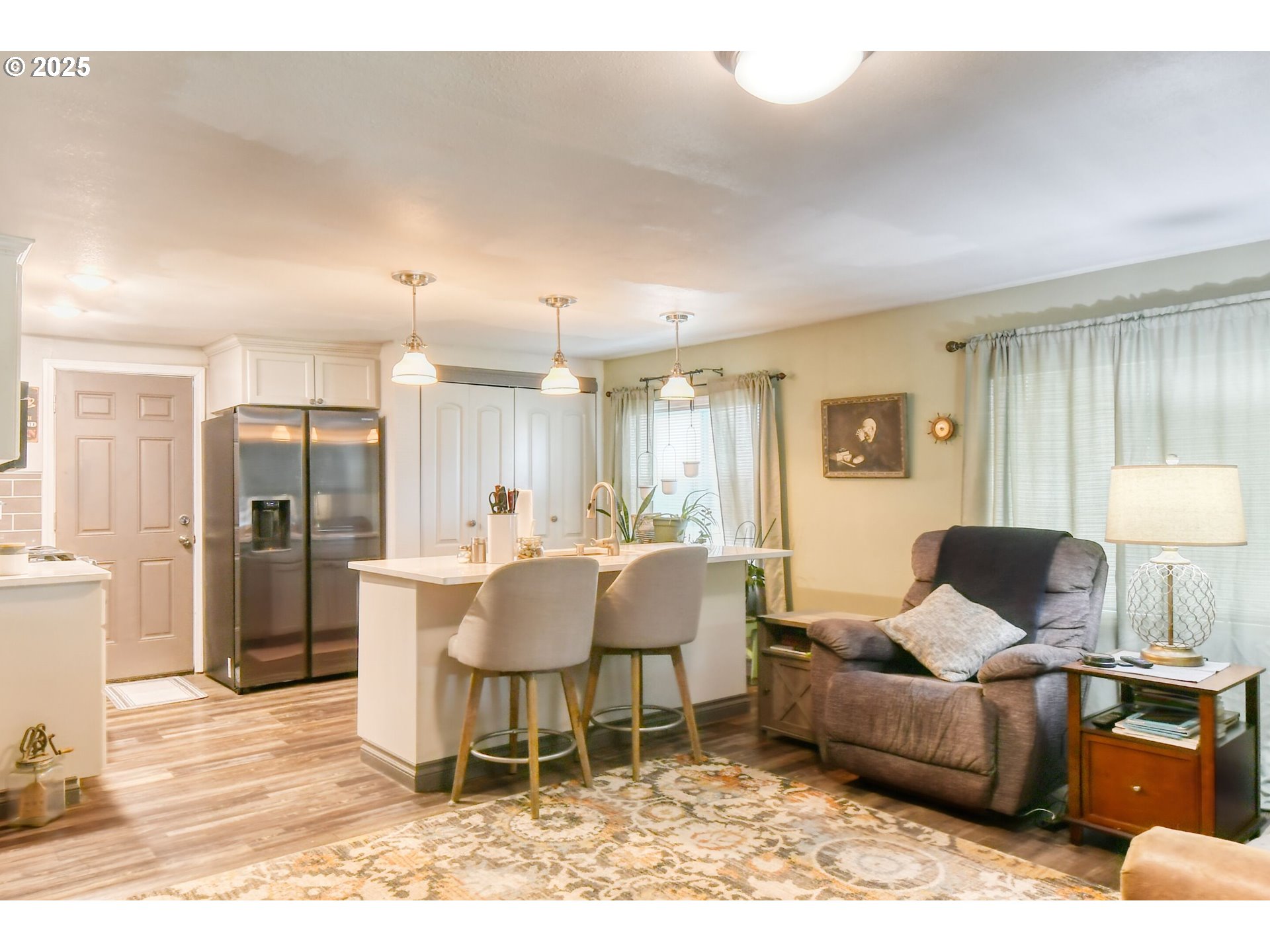 330 2nd Street Athena, OR 97813 - Photo 6 of 30 a living room with furniture and a wooden floor