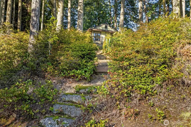 a view of a lake with a yard