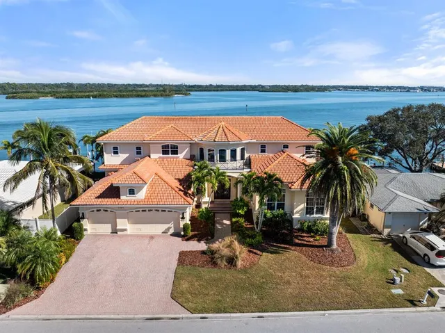 a view of a swimming pool with a lounge chair
