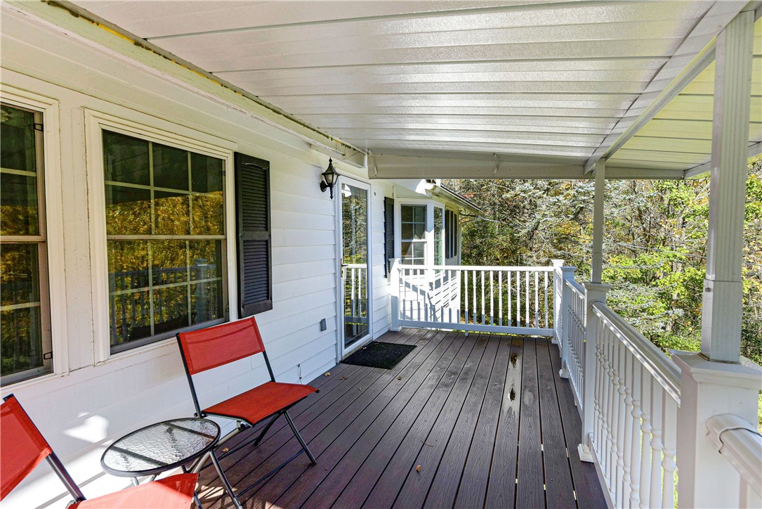 6088 Middlebrook Road South Bristol, NY 14512 - Photo 12 of 50 Deck with Awning looks over the pond and out towar