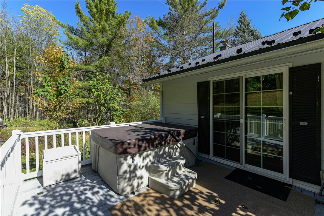 6088 Middlebrook Road South Bristol, NY 14512 - Photo 38 of 50 Deck and Hot Tub on Rear Deck off of Primary Bedro
