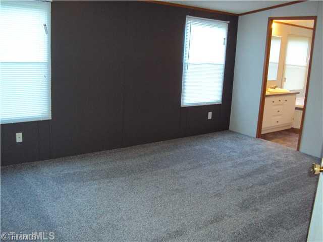 210 Arrowhead Ruffin, NC 27326 - Photo 5 of 12 Master Bedroom.