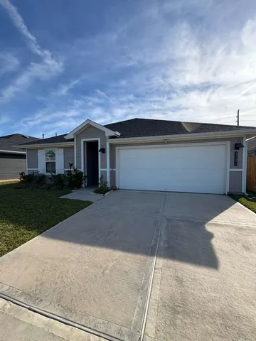 a front view of house with yard