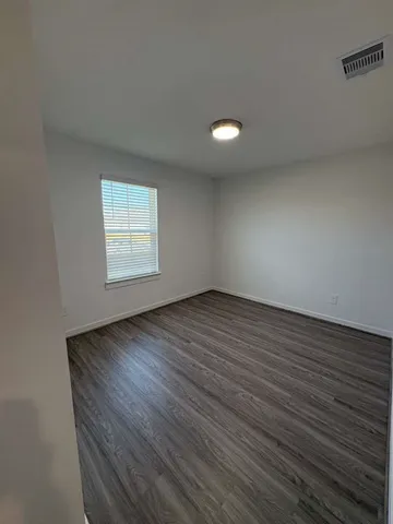 a bathroom with a sink a toilet and a bathtub