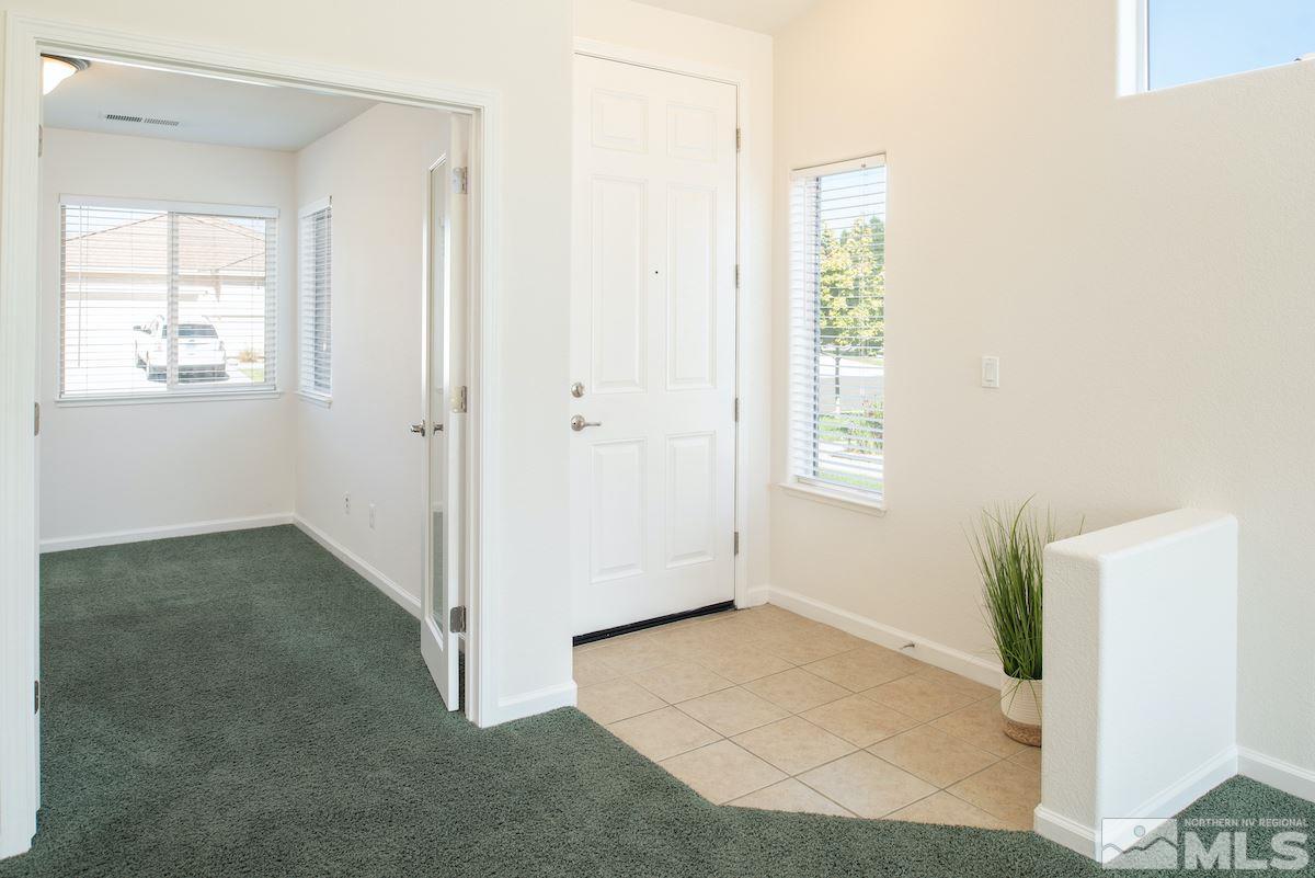 10340 Rosemount Drive Reno, NV 89521 - Photo 8 of 28 a view of livingroom with natural light