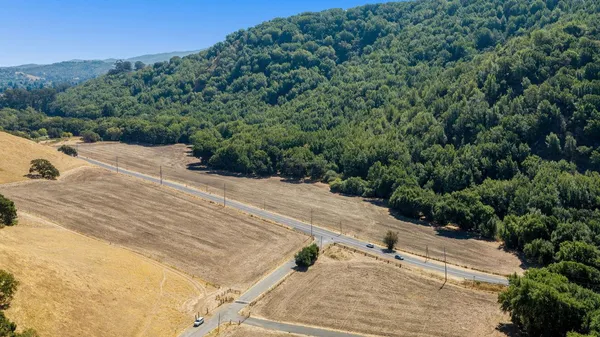 an aerial view of residential house with outdoor space