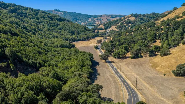 a view of a yard with a mountain