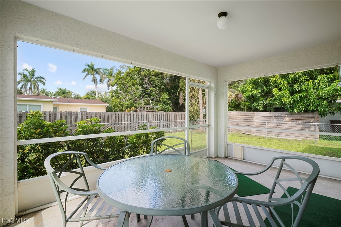 2932 Holly Road Fort Myers, FL 33901 - Photo 22 of 39 a view of a dining room with furniture window and outside view