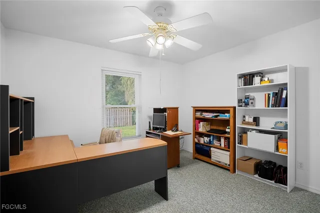 a room with furniture a washer and dryer