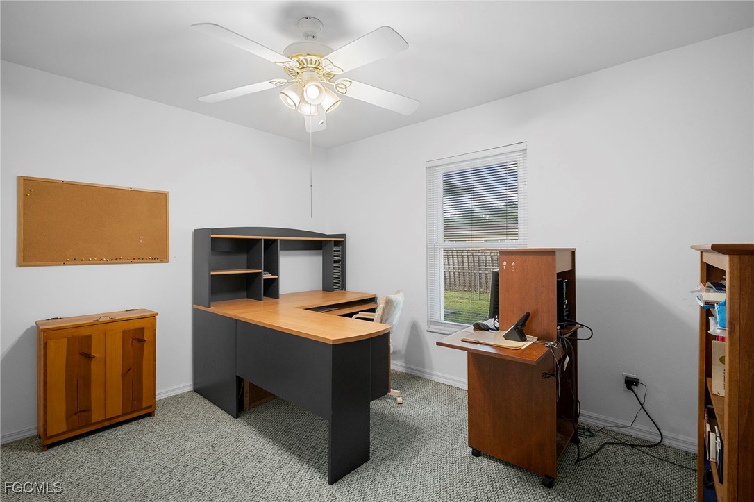 2932 Holly Road Fort Myers, FL 33901 - Photo 31 of 39 a room with furniture a washer and dryer