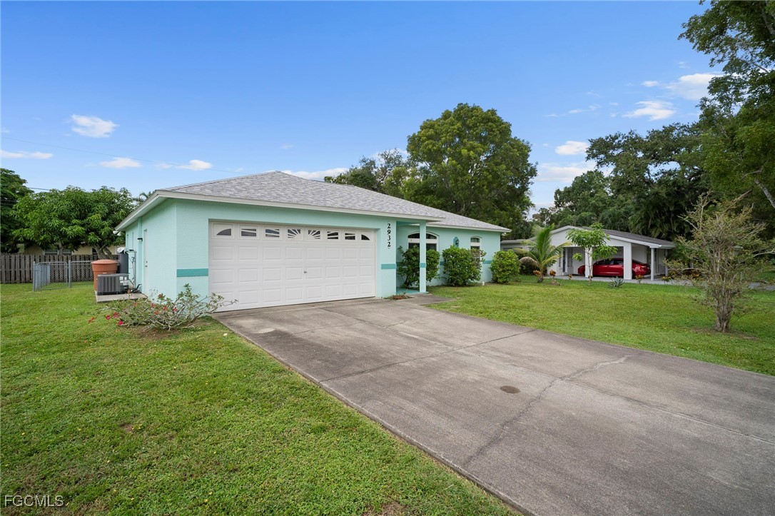 2932 Holly Road Fort Myers, FL 33901 - Photo 38 of 39 a view of outdoor space yard and garage