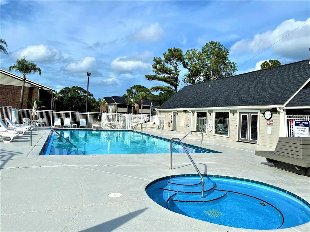 1400 Gandy Boulevard North, Unit 412 St. Petersburg, FL 33702 - Photo 39 of 44 a view of a house with swimming pool