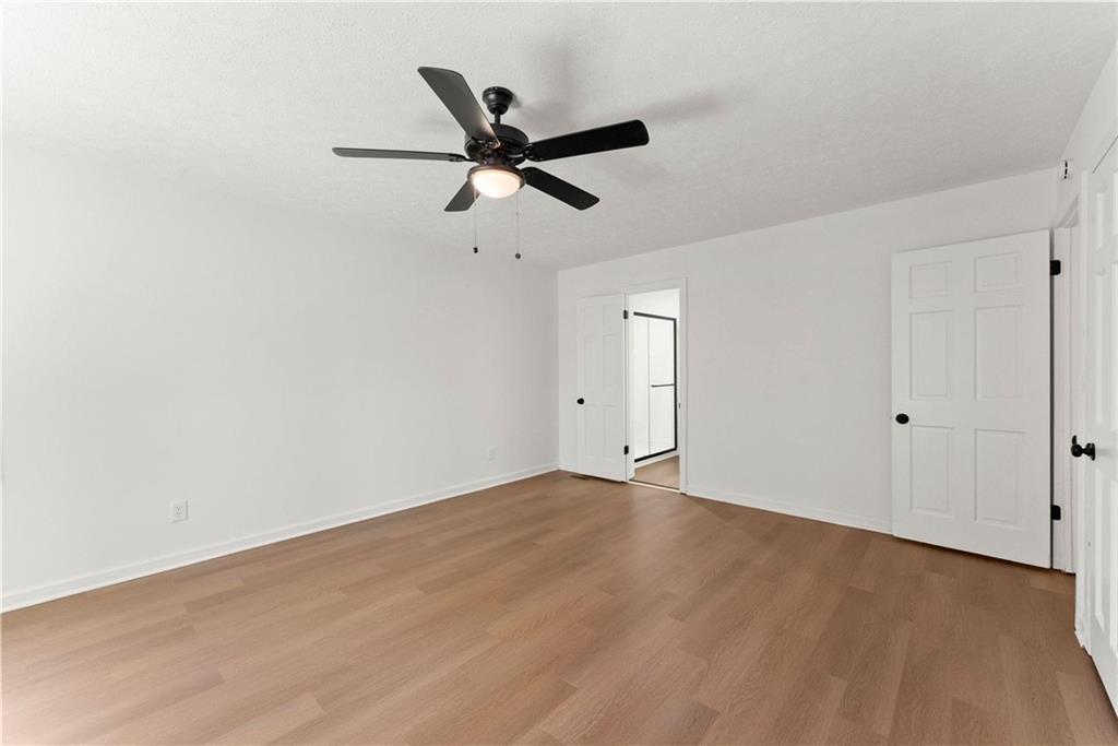 225 Northview Drive Commerce, GA 30529 - Photo 17 of 39 a view of a big room with wooden floor