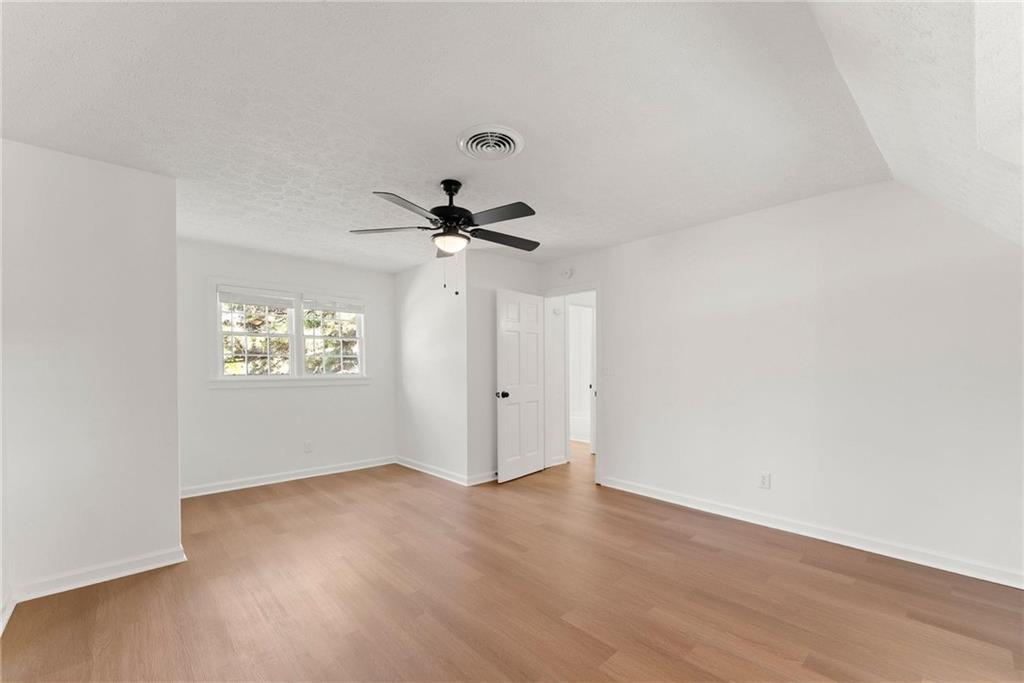 225 Northview Drive Commerce, GA 30529 - Photo 27 of 39 a view of empty room with wooden floor