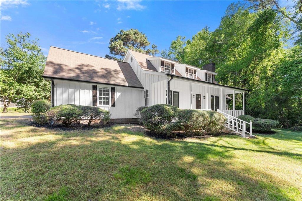 225 Northview Drive Commerce, GA 30529 - Photo 29 of 39 a view of a house with swimming pool and garden